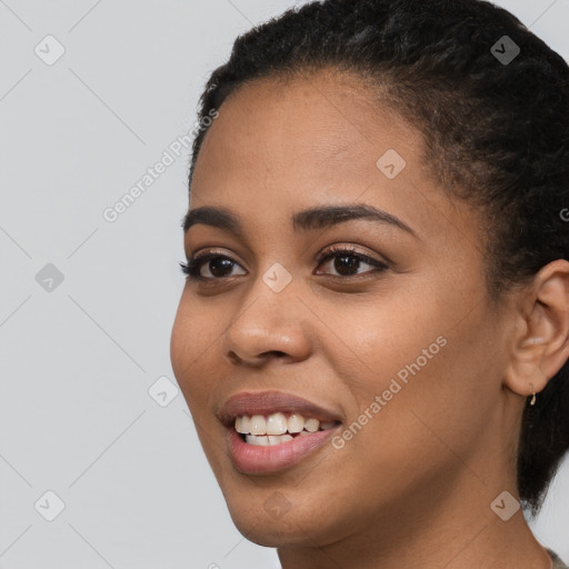 Joyful latino young-adult female with short  brown hair and brown eyes