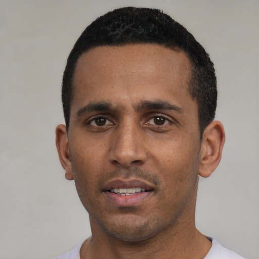 Neutral black young-adult male with short  black hair and brown eyes