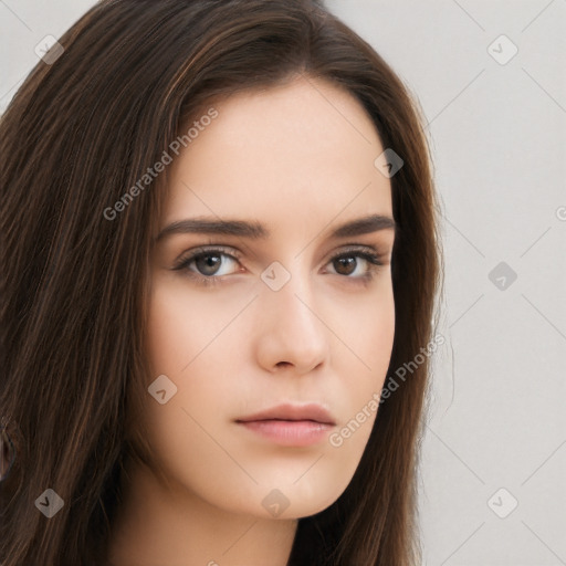 Neutral white young-adult female with long  brown hair and brown eyes