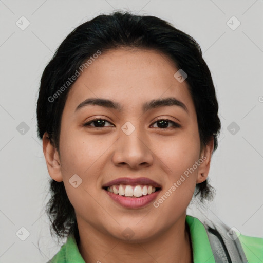 Joyful asian young-adult female with medium  black hair and brown eyes