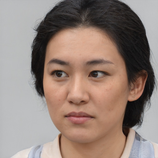 Neutral white young-adult female with medium  brown hair and brown eyes