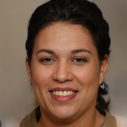 Joyful white adult female with short  brown hair and brown eyes