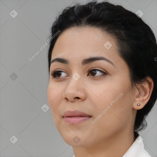 Neutral black young-adult female with short  black hair and brown eyes