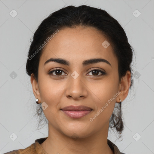 Joyful latino young-adult female with medium  brown hair and brown eyes