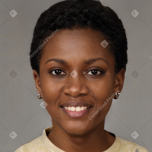 Joyful black young-adult female with short  black hair and brown eyes