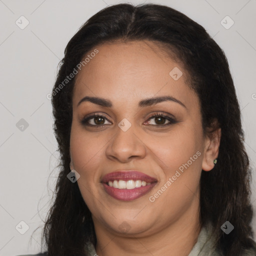 Joyful latino young-adult female with long  brown hair and brown eyes