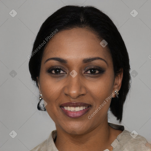 Joyful black young-adult female with medium  black hair and brown eyes