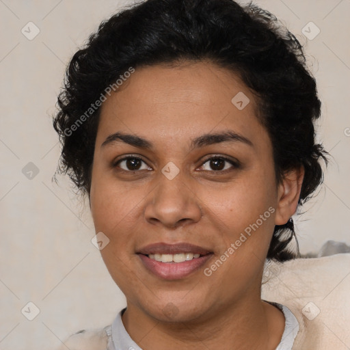 Joyful latino adult female with medium  brown hair and brown eyes