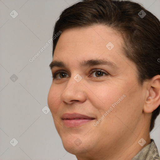 Joyful white adult female with short  brown hair and brown eyes