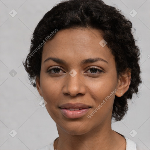 Joyful latino young-adult female with short  black hair and brown eyes