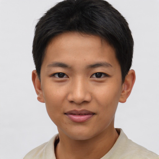 Joyful asian young-adult male with short  brown hair and brown eyes