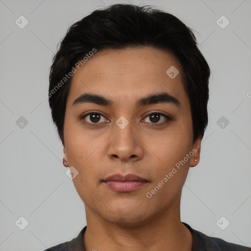 Neutral latino young-adult male with short  black hair and brown eyes