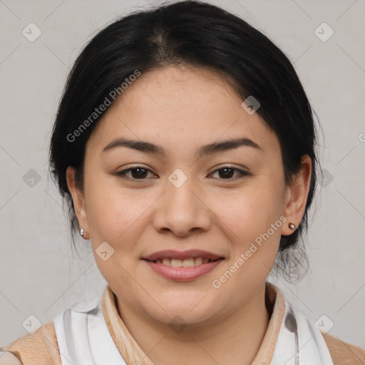 Joyful latino young-adult female with medium  brown hair and brown eyes