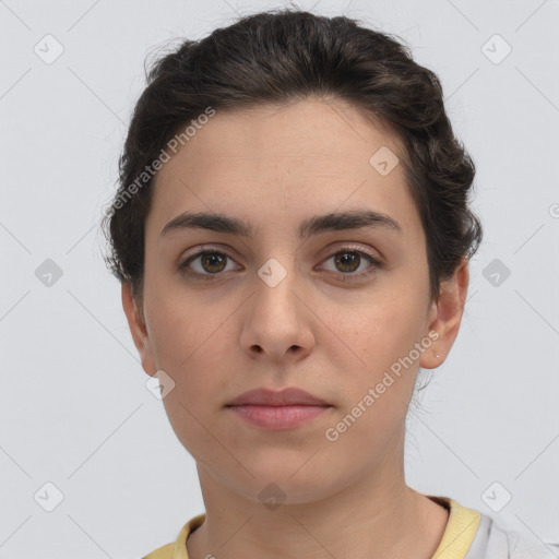 Neutral white young-adult female with short  brown hair and brown eyes