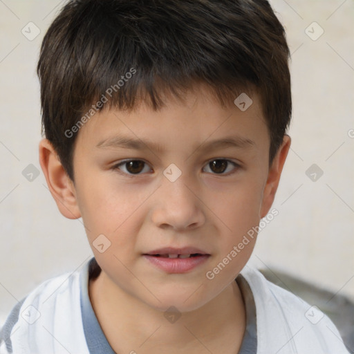 Joyful white child male with short  brown hair and brown eyes