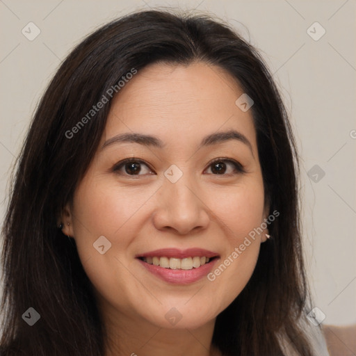 Joyful asian young-adult female with long  brown hair and brown eyes