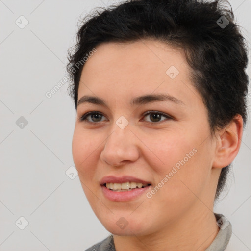 Joyful white young-adult female with short  brown hair and brown eyes