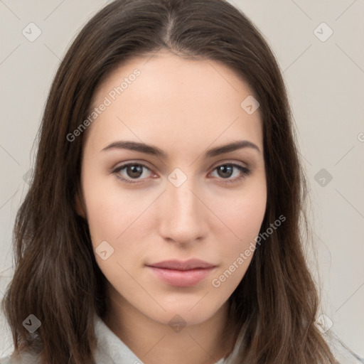 Neutral white young-adult female with long  brown hair and brown eyes