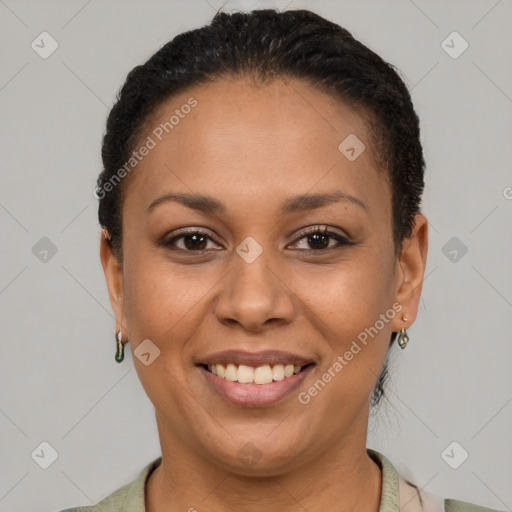 Joyful latino adult female with short  brown hair and brown eyes