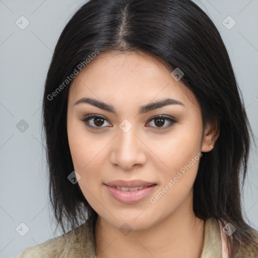 Joyful asian young-adult female with long  brown hair and brown eyes