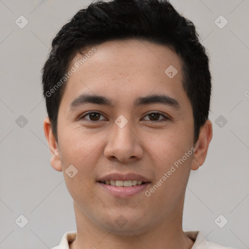 Joyful white young-adult male with short  black hair and brown eyes