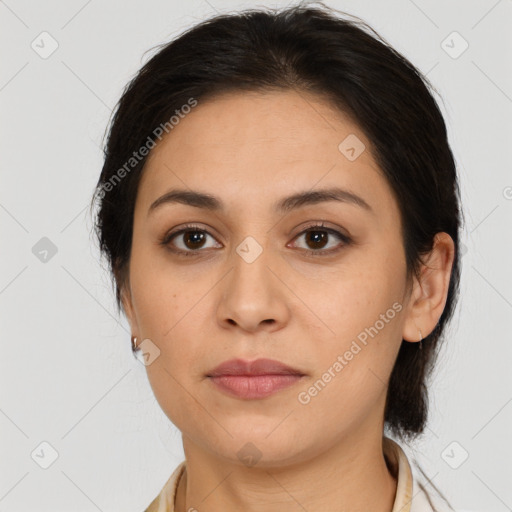 Joyful latino young-adult female with medium  brown hair and brown eyes