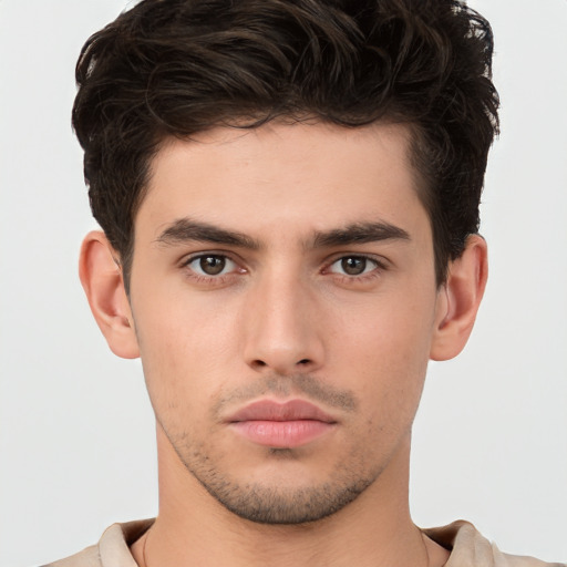 Neutral white young-adult male with short  brown hair and brown eyes