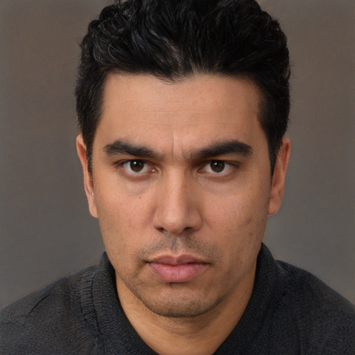 Neutral white young-adult male with short  black hair and brown eyes