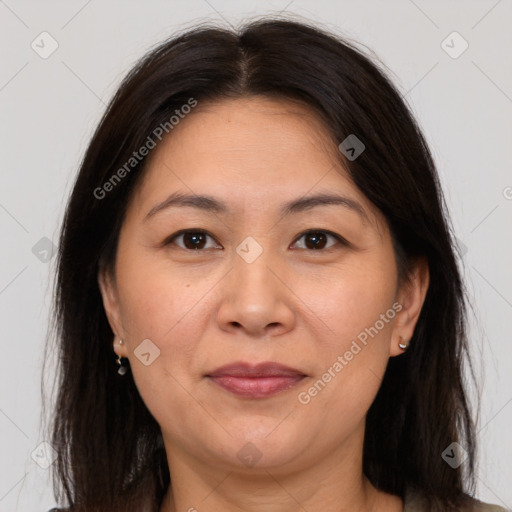 Joyful white adult female with medium  brown hair and brown eyes