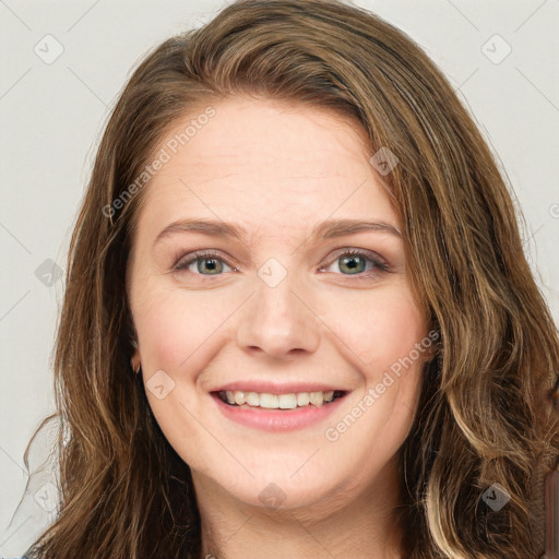 Joyful white young-adult female with long  brown hair and green eyes