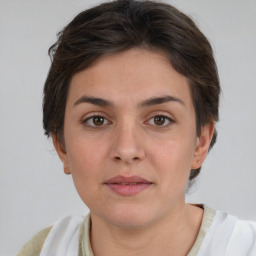 Neutral white young-adult female with short  brown hair and brown eyes