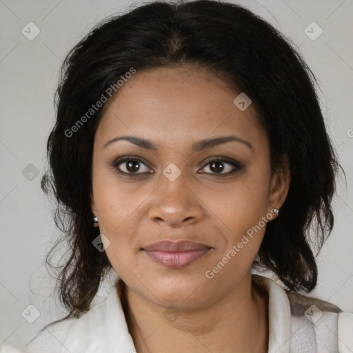 Joyful black adult female with medium  brown hair and brown eyes
