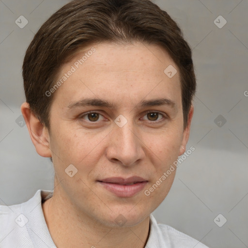 Joyful white young-adult male with short  brown hair and brown eyes