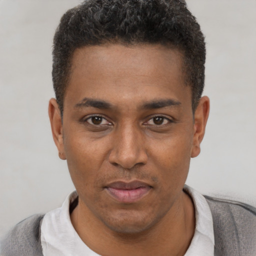 Neutral latino young-adult male with short  brown hair and brown eyes