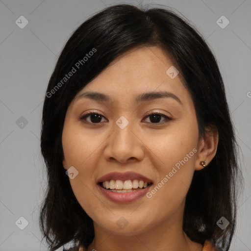 Joyful asian young-adult female with medium  brown hair and brown eyes