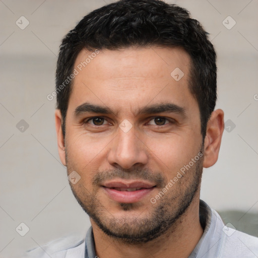 Joyful white young-adult male with short  black hair and brown eyes