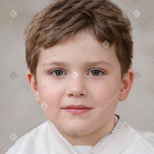 Joyful white child male with short  brown hair and grey eyes