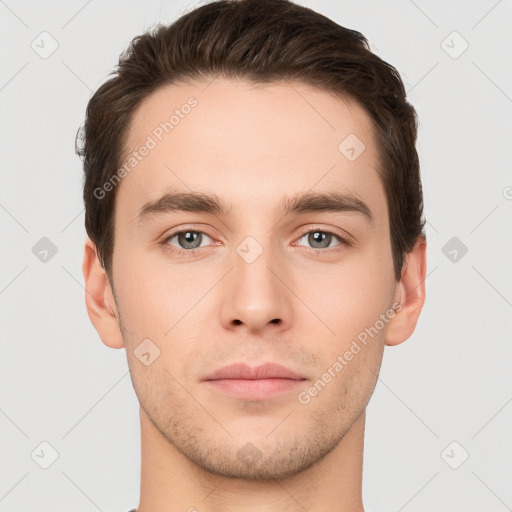 Neutral white young-adult male with short  brown hair and brown eyes