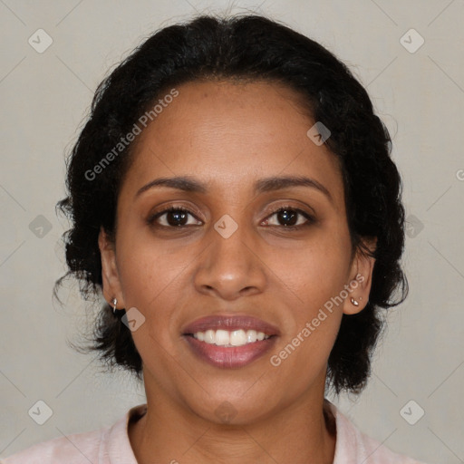 Joyful black young-adult female with medium  brown hair and brown eyes