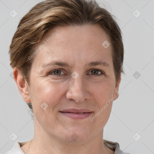 Joyful white adult female with short  brown hair and grey eyes