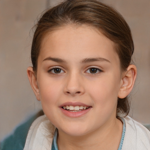 Joyful white child female with medium  brown hair and brown eyes