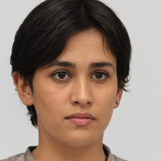 Neutral asian young-adult female with medium  brown hair and brown eyes