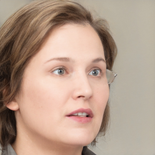 Neutral white young-adult female with medium  brown hair and grey eyes