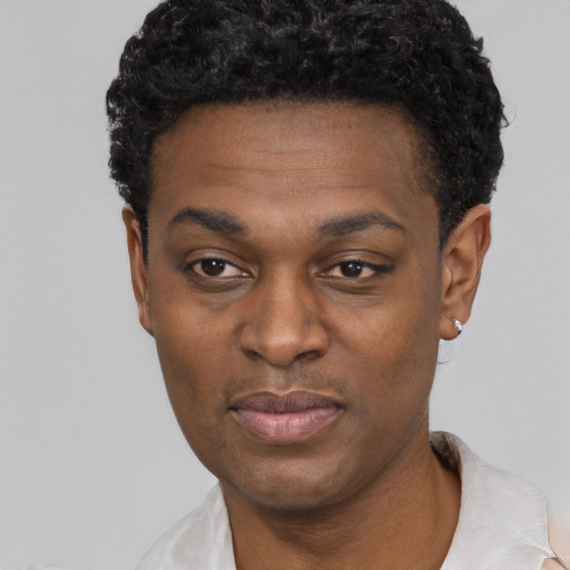 Neutral black young-adult male with short  black hair and brown eyes