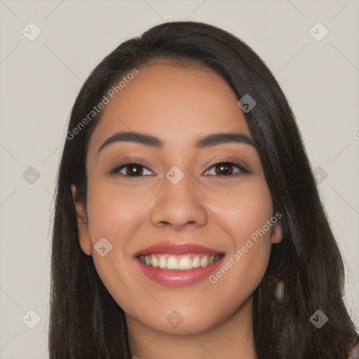 Joyful white young-adult female with long  black hair and brown eyes