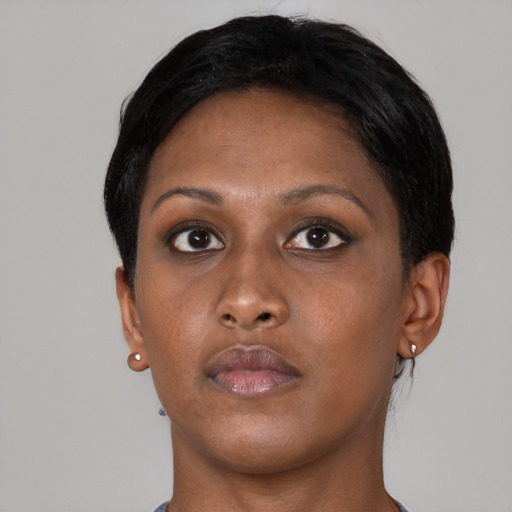 Neutral black young-adult female with short  brown hair and brown eyes