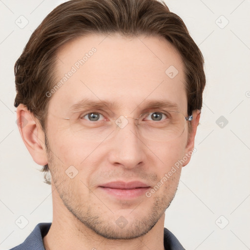 Joyful white adult male with short  brown hair and grey eyes