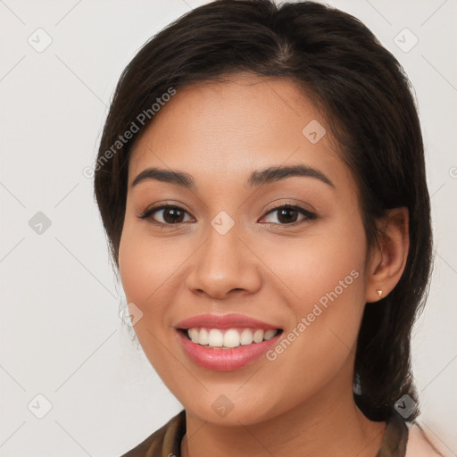 Joyful white young-adult female with medium  brown hair and brown eyes