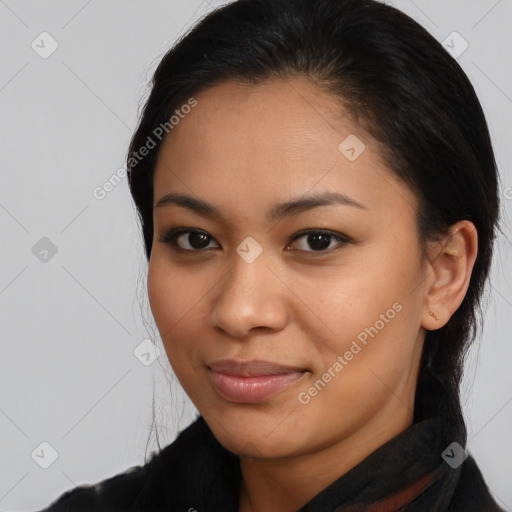 Joyful latino young-adult female with medium  black hair and brown eyes