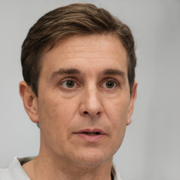 Neutral white adult male with short  brown hair and brown eyes